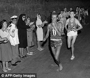 Ethiopian Abebe Bikila on his way to gold in the 1960 Olympic marathon - running barefoot